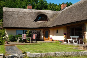 Reeddachhaus mit Seeblick - Ruhe - traumhafter Lage am Selliner See